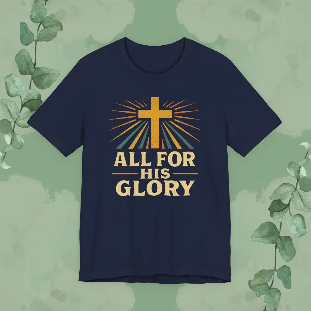 Navy blue t-shirt with a cross and 'All for His Glory' text on a green leafy background