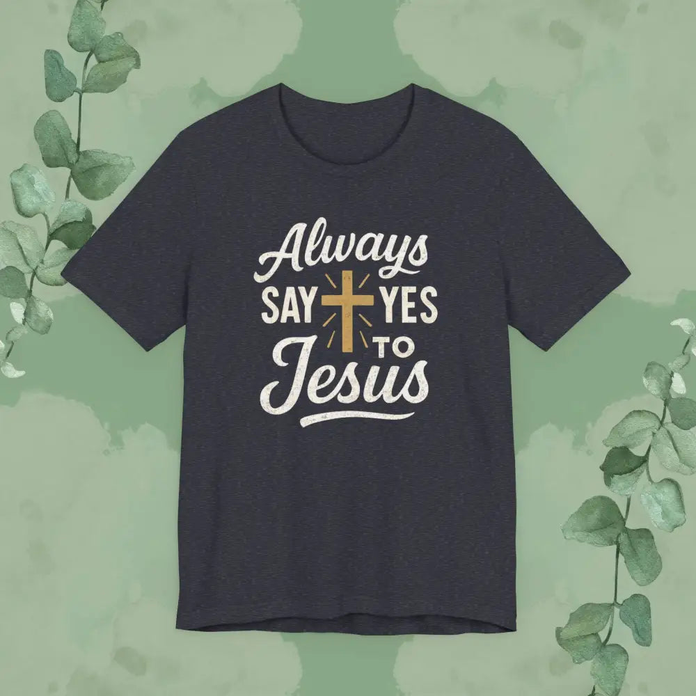 Navy blue t-shirt with 'Always say yes to Jesus' text on a green background