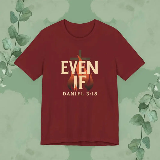 Red t-shirt with 'Even If' and 'Daniel 3:18' text on a green background with leaves.
