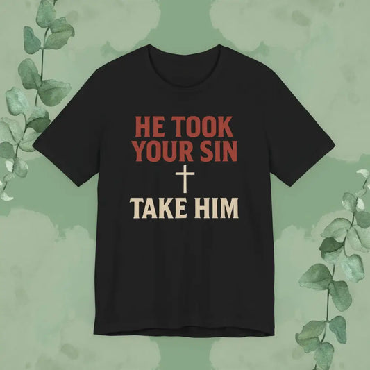 Black t-shirt with red and beige text on a green background