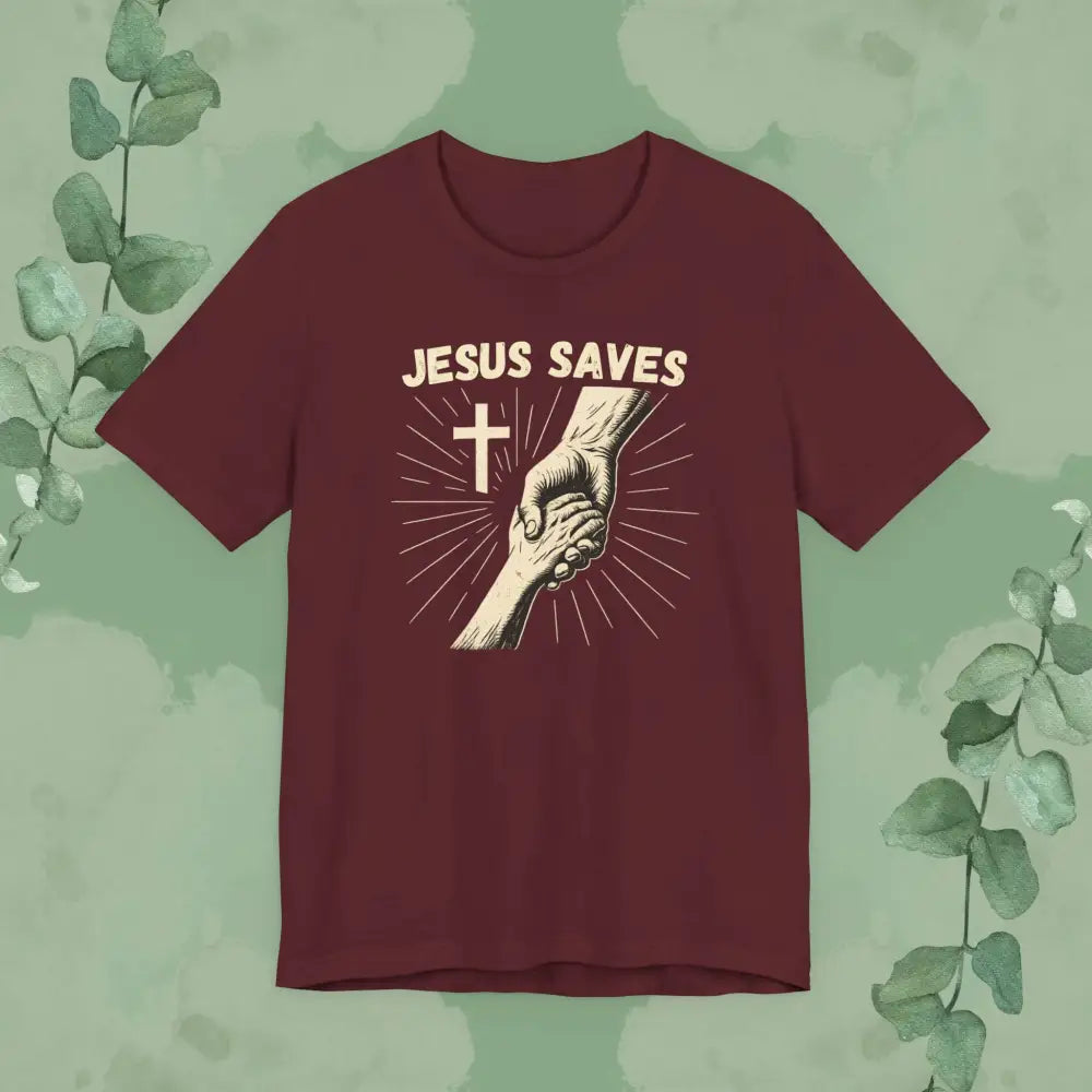 Maroon t-shirt with 'Jesus Saves' graphic on a green background
