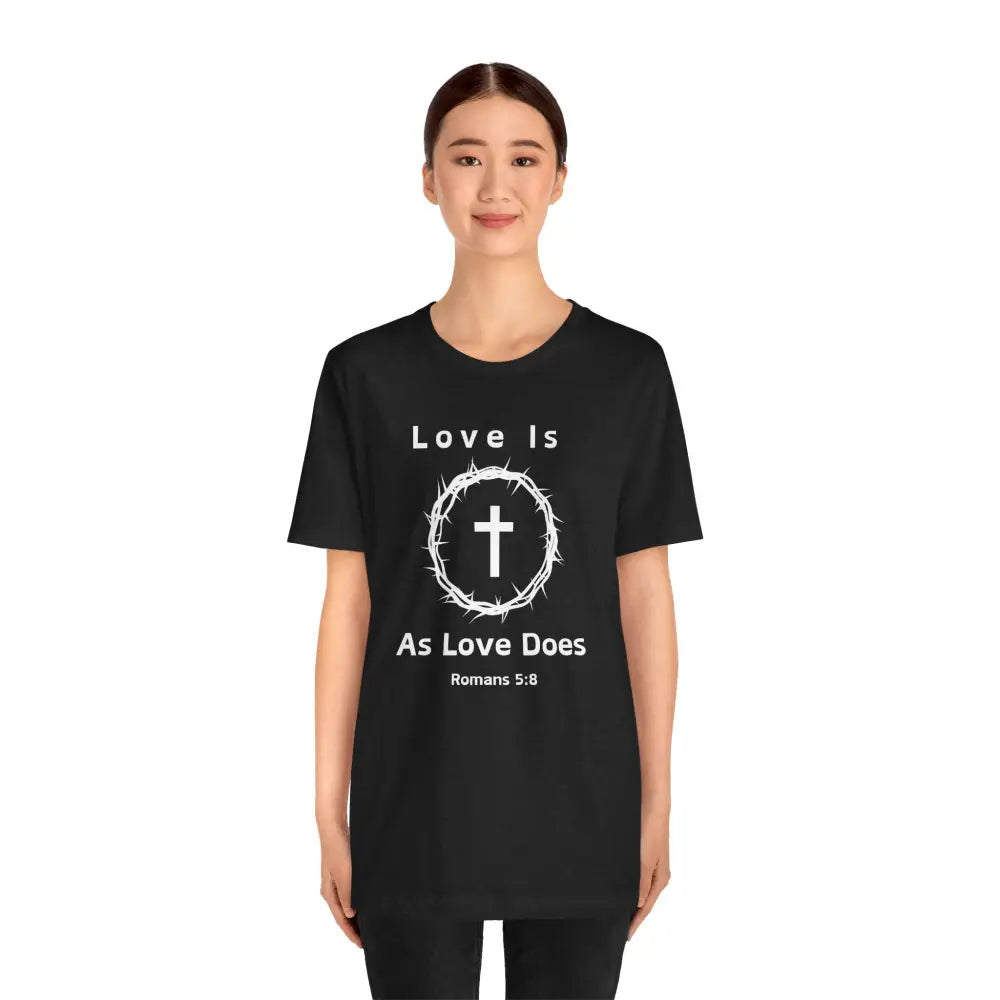 “Love Is As Love Does” Romans 5:8 Christian T-Shirt – Crown of Thorns Cross Design - T-Shirt