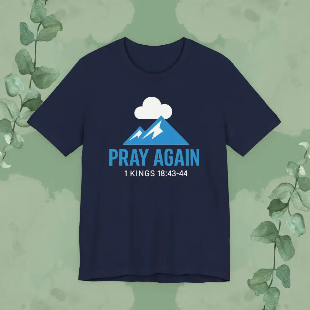 Navy blue t-shirt with blue graphic and text on a green background