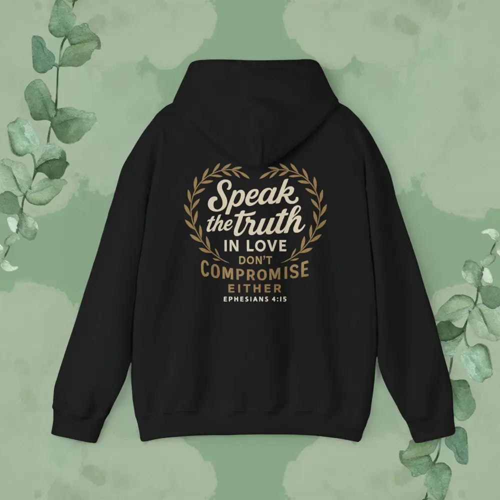 Black hoodie with text on the back against a green leafy background