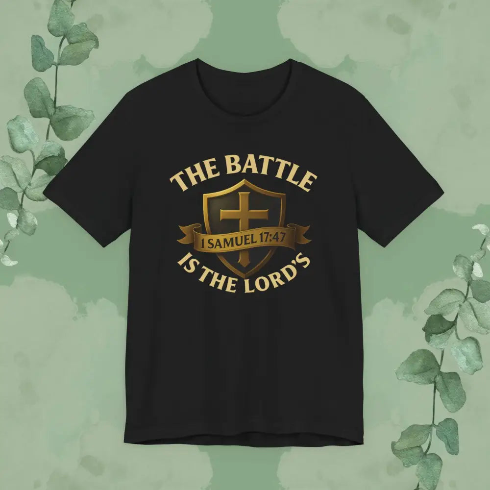 Black t-shirt with gold text and cross design on a green background