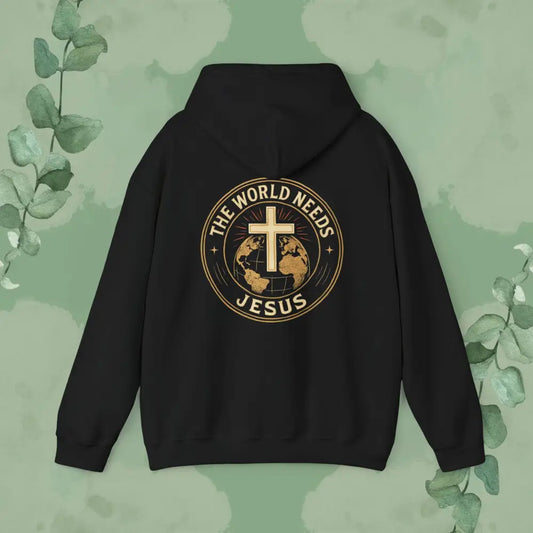 Black hoodie with 'The World Needs Jesus' design on a green background with leaves.