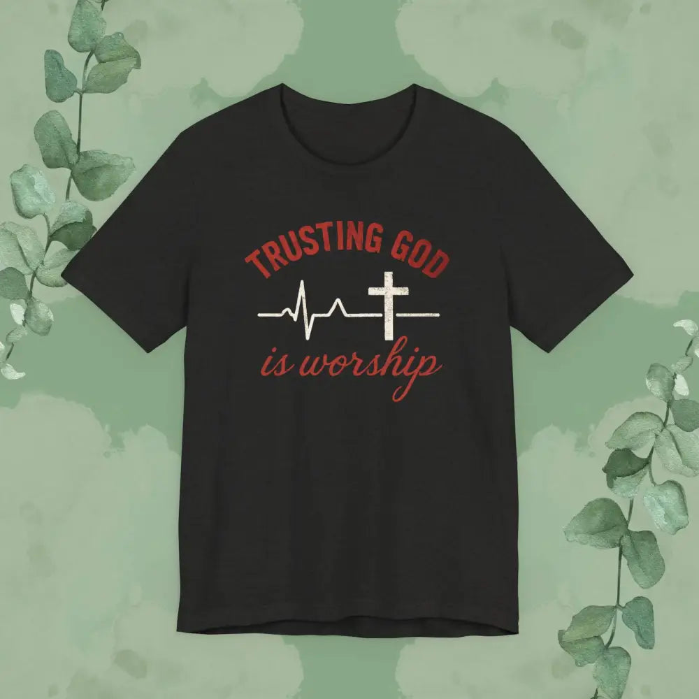Black t-shirt with 'Trusting God is worship' design on a green background