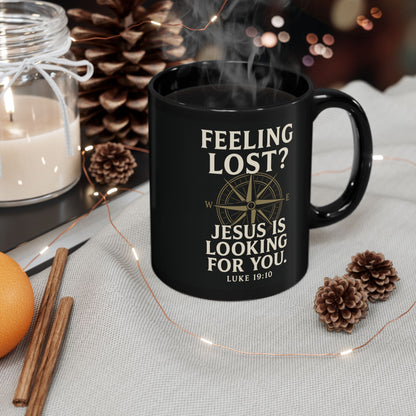 Black Christian mug with “Feeling Lost? Jesus Is Looking for You” Luke 19:10 design
