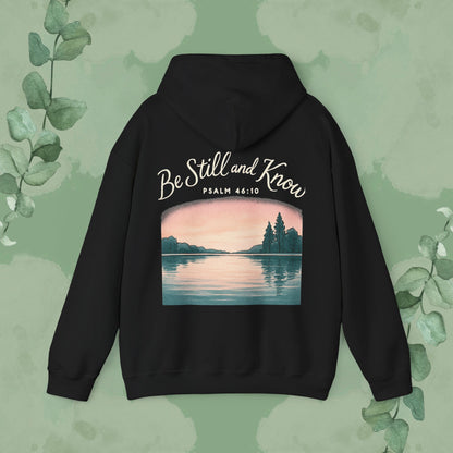 Black Christian sweatshirt with “Be Still and Know” Psalm 46:10 design