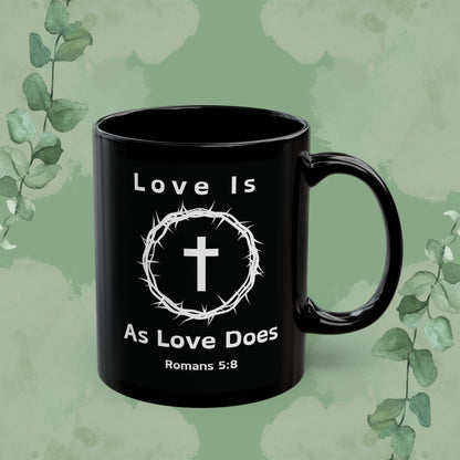 “Love Is As Love Does” Christian Mug – Romans 5:8 – Cross & Crown Design