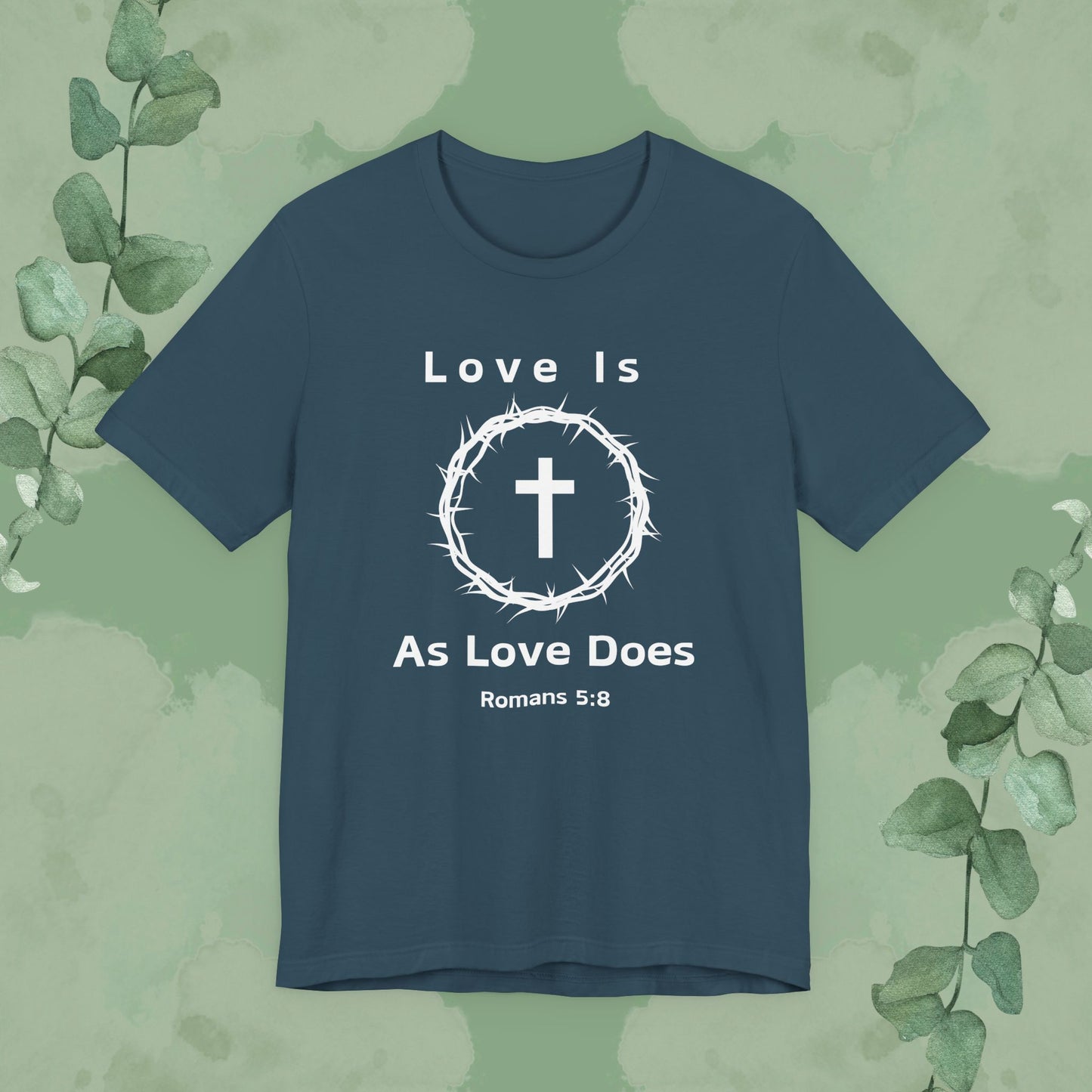 “Love Is As Love Does” Romans 5:8 Christian T-Shirt – Crown of Thorns Cross Design