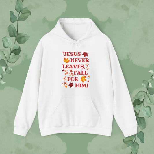 White Christian hoodie with “Jesus Never Leaves – Fall for Him!” autumn faith design
