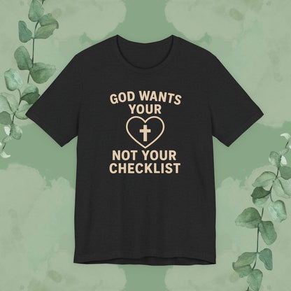 Black Christian T-shirt with “God Wants Your Heart, Not Your Checklist” design
