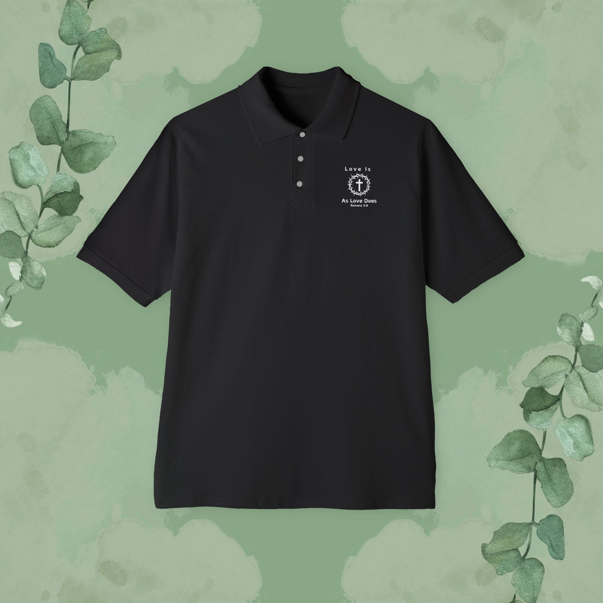 Black Christian polo shirt with “Love Is As Love Does” left-chest faith design