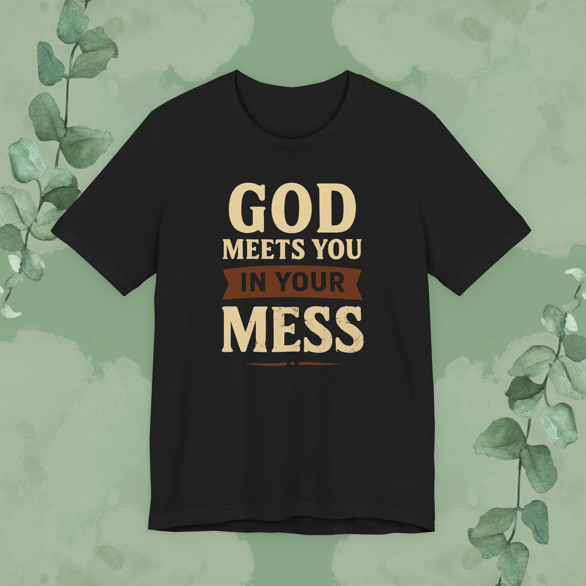 Black Christian T-shirt with “God Meets You in Your Mess” faith design