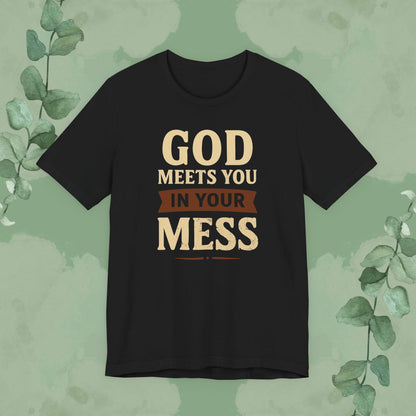 Black Christian T-shirt with “God Meets You in Your Mess” faith design