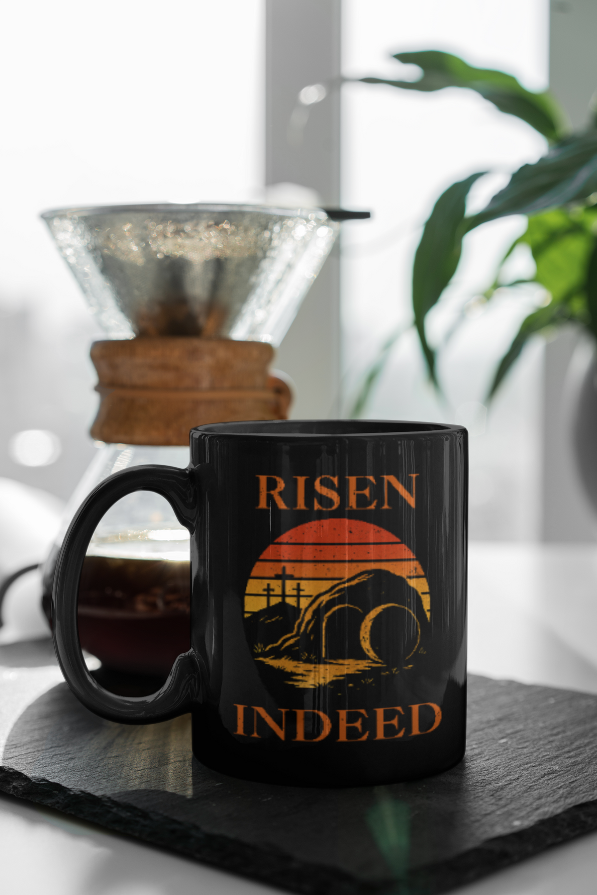 Black Christian mug with “Risen Indeed” resurrection sunrise design