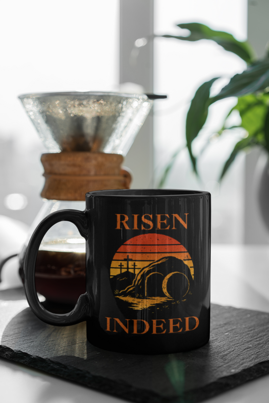 Black Christian mug with “Risen Indeed” resurrection sunrise design