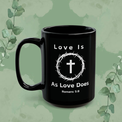 “Love Is As Love Does” Christian Mug – Romans 5:8 – Cross & Crown Design
