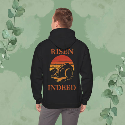 Black Christian hoodie with “Risen Indeed” resurrection design and sunset imagery