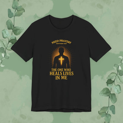 Black Christian T-shirt with “Need Prayer? The One Who Heals Lives in Me” design