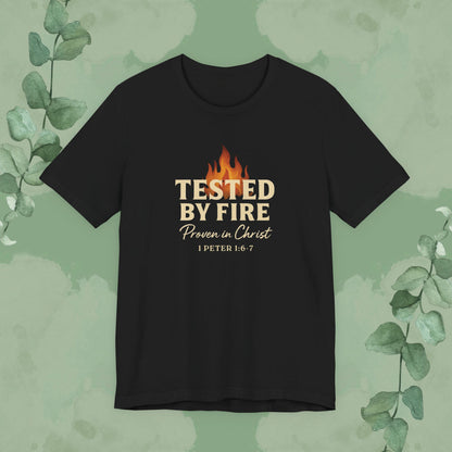 Black Christian T-shirt with “Tested by Fire – Proven in Christ” faith design