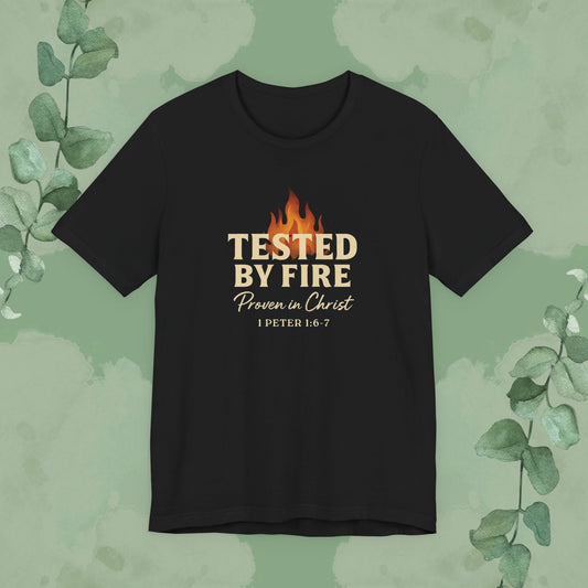 Black Christian T-shirt with “Tested by Fire – Proven in Christ” faith design