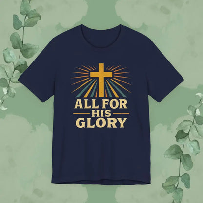 Navy blue t-shirt with a cross and 'All for His Glory' text on a green leafy background