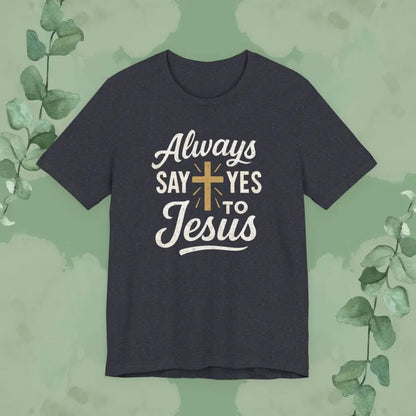 Navy blue t-shirt with 'Always say yes to Jesus' text on a green background