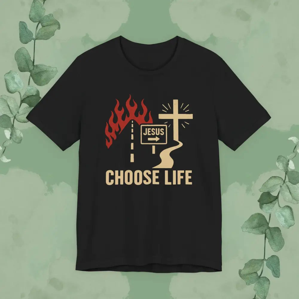 Black t-shirt with a graphic design featuring flames, a cross, and text on a green background.