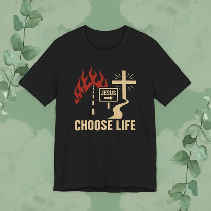 Black t-shirt with a graphic design featuring flames, a cross, and text on a green background.