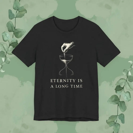 Black t-shirt with a graphic design and text 'Eternity is a long time' on a green background with leaves.