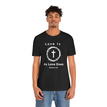 “Love Is As Love Does” Romans 5:8 Christian T-Shirt – Crown of Thorns Cross Design - T-Shirt