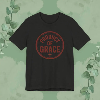 Black t-shirt with 'Product of Grace' text on a green background